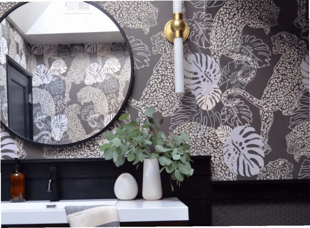 Moody leopard pattern bathroom wallpaper for a dark aesthetic