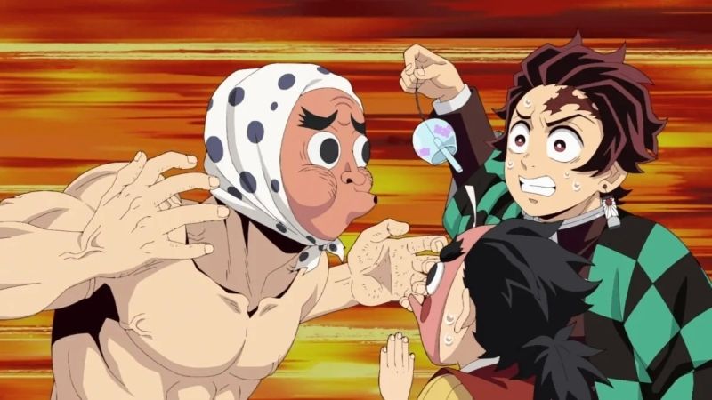 Ảnh Kimetsu Yaiba chibi của Inosuke ngồi trên mỏm đá